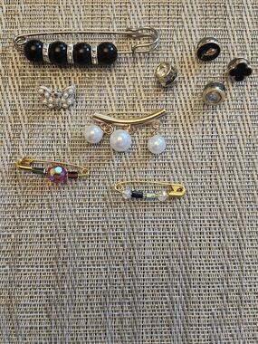Hand Crafted Gold-tone Brooch Set with Black, White, and Multicolor Accents